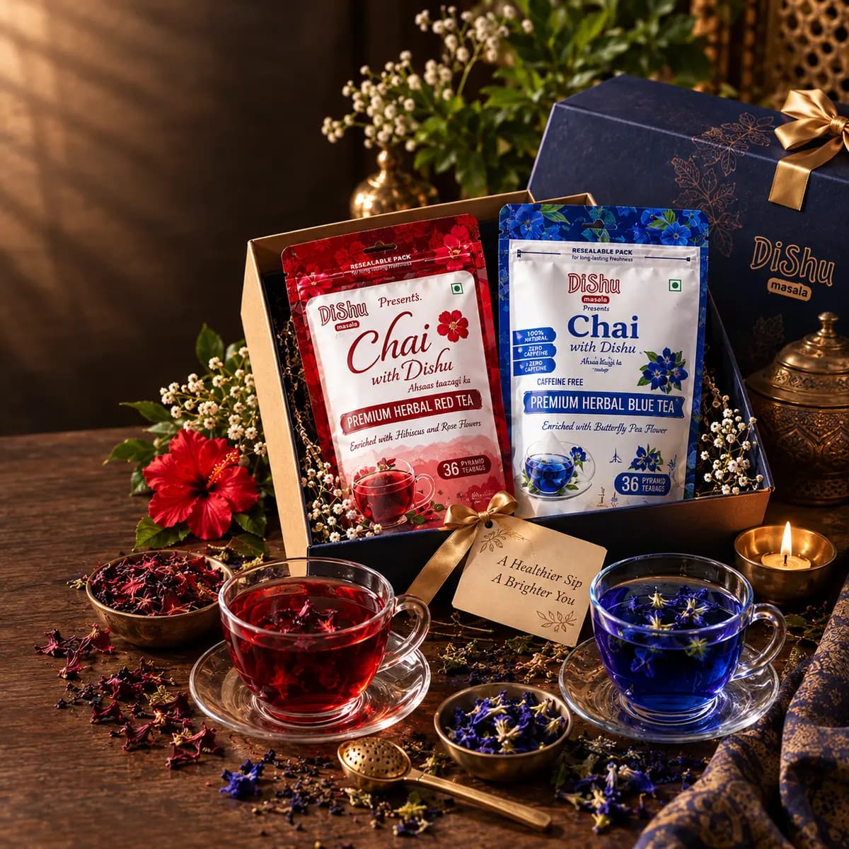 Blue + Red Duo — Chai with Dishu Premium Herbal Blue Tea and Red Tea, festive gift sleeve, brewed blue and red tea in glass cups